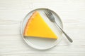 Slice of delicious homemade lemon pie on white wooden table, top view Royalty Free Stock Photo