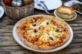 Slice of delicious pizza On a plate on wooden table Royalty Free Stock Photo