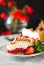 Slice of delicious strawberry tart with meringue on wooden background. Summer food Royalty Free Stock Photo