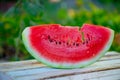 a slice of delicious watermelon is on the table Royalty Free Stock Photo