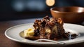 Delicious Bread Pudding Dessert with Chocolate Sauce and Butter on Elegant Plate Royalty Free Stock Photo