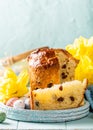 Slice of easter orthodox sweet bread, kulich end quail eggs.