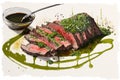 slice of flank steak with chimichurri sauce drizzle