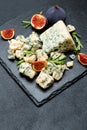 Slice of French Roquefort cheese with figs Royalty Free Stock Photo