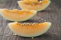 Slice fresh cantaloupe melon on cutting board, freshness yellow Royalty Free Stock Photo