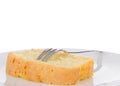 Slice of fresh homemade butter cake on a plate