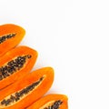 Slice of fresh papaya on white background. Flat lay. Top view. Fruit concept Royalty Free Stock Photo