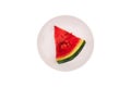 Slice of fresh watermelon on a white plate. Juicy slice of watermelon isolated on a white background Royalty Free Stock Photo