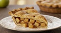 A Slice of Golden Brown Apple Pie on a White Plate Royalty Free Stock Photo