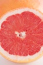 Slice of grapefruit close-up macro copy space Royalty Free Stock Photo