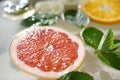 A slice of grapefruit with the mint and orange