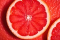 Slice of grapefruit. Red grapefruit background. Composition of half Orange.