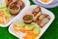 Slice grilled pork and spicy sauce is popular street food in Bangkok, Thailand