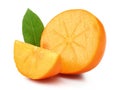 Slice and Half Persimmon with green leaf Royalty Free Stock Photo