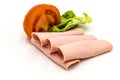 Slice of ham or Paris sausage on a white background with