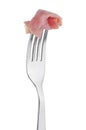 Slice of ham skewered on a fork Royalty Free Stock Photo