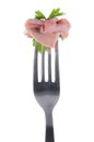 Slice of ham skewered on a fork Royalty Free Stock Photo