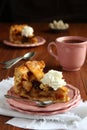 Slice of homemade dutch apple cake with whipped cream