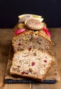 Slice of Homemade Tasty Fruit Cake Cake with Dried Fruit and Nuts Wooden Background Vertical Royalty Free Stock Photo