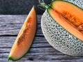 Slice of Japanese melon,Fresh Japanese melon on the wooden table Royalty Free Stock Photo