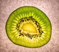 Slice of juicy kiwi fruit. Royalty Free Stock Photo