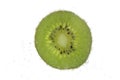 Slice of kiwi in carbonated water isolated Royalty Free Stock Photo