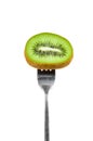 Slice of kiwi on a fork Royalty Free Stock Photo