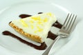 A slice of lemon cheesecake dessert