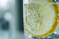 Slice of lemon in glass of soda or water. Generative AI