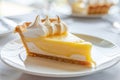 Slice of lemon meringue pie on plate Royalty Free Stock Photo