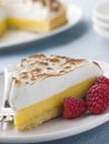 Slice Of Lemon Meringue Pie With Raspberries Royalty Free Stock Photo