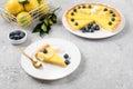 A slice of lemon pie with blueberries on a white plate. Royalty Free Stock Photo