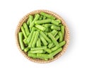 Slice long beans in basket on white background. top view Royalty Free Stock Photo