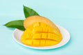 Slice mango fruit on white plate Royalty Free Stock Photo