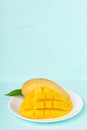 Slice mango fruit on white plate Royalty Free Stock Photo