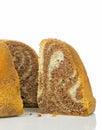 A slice of a marble sponge cake Royalty Free Stock Photo