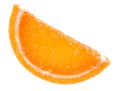 A slice of marmalade orange is isolated on a white background. Marmalade candy Royalty Free Stock Photo