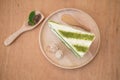 Slice of Matcha green tea cake cheesecake Royalty Free Stock Photo