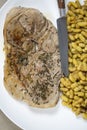 Slice of mutton leg and flageolet beans Royalty Free Stock Photo