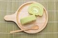 Slice of pandan roll cake