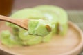 Slice of pandan roll cake