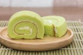 Slice of pandan roll cake