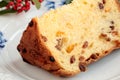 Slice Panettone Christmas cake on plate gold