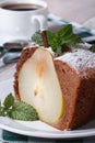 Slice of pear cake closeup on a white plate vertical Royalty Free Stock Photo