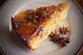 A slice of pear upside down cake on a plate Royalty Free Stock Photo