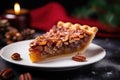 slice of pecan pie on a plain white plate Royalty Free Stock Photo