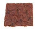 Slice of peppered beef jerky on a white background Royalty Free Stock Photo