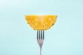 Slice pineapple on fork for eating Royalty Free Stock Photo