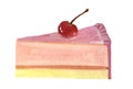 A slice of pink cheesecake with a cherry.