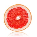 Slice of pink grapefruit isolated on white Royalty Free Stock Photo